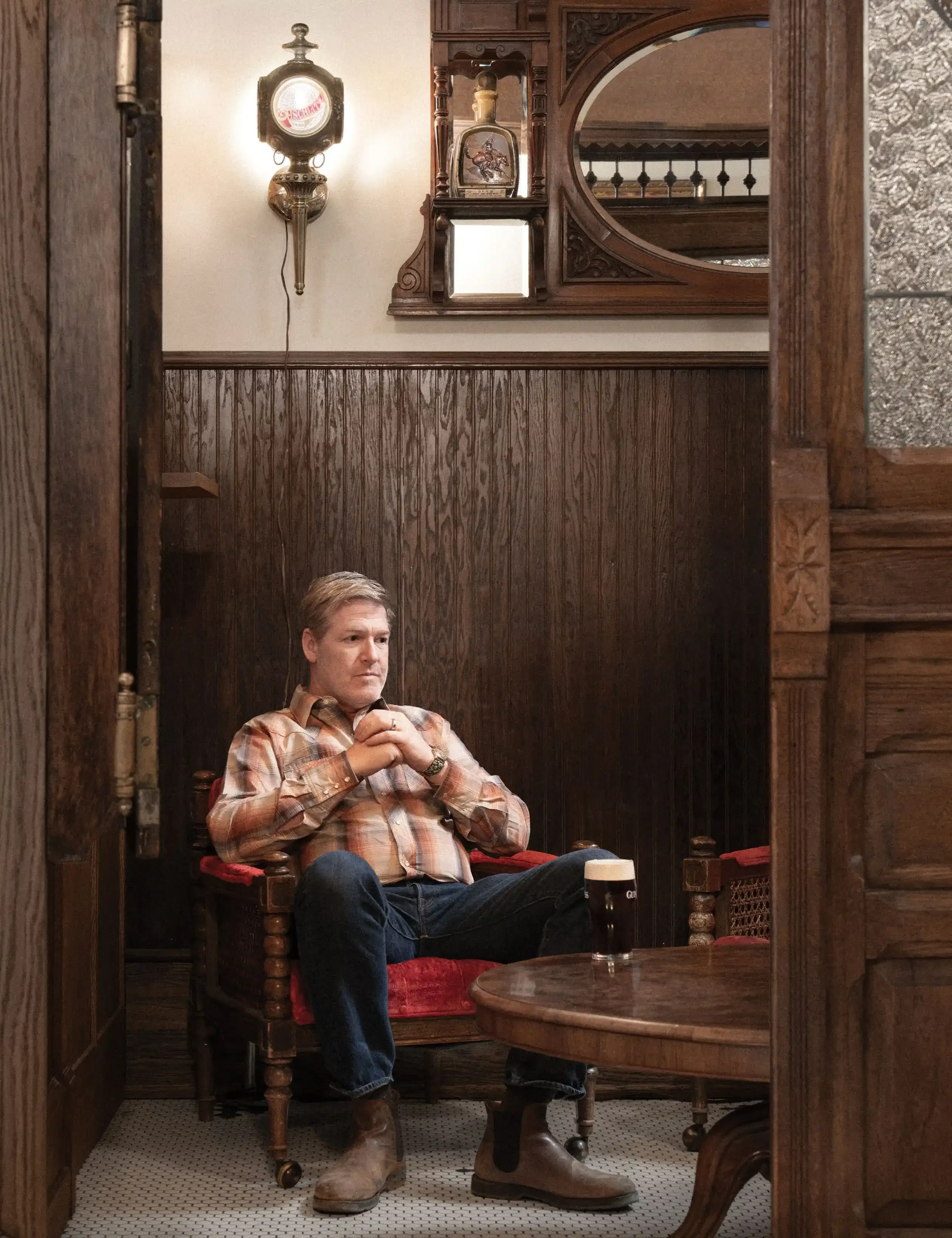 Shaking The Glass Ball: Stockman's & Beyond 2 Saloon owner Brett Evje sips a beer in his Irish snug at the new Stockman's Bar
