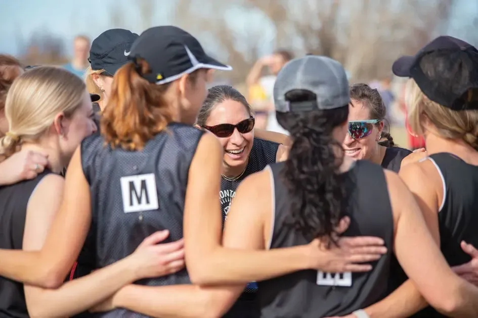 The Race of Every Runner's Dreams 4 The Billings women’s team huddles in a circle before the race