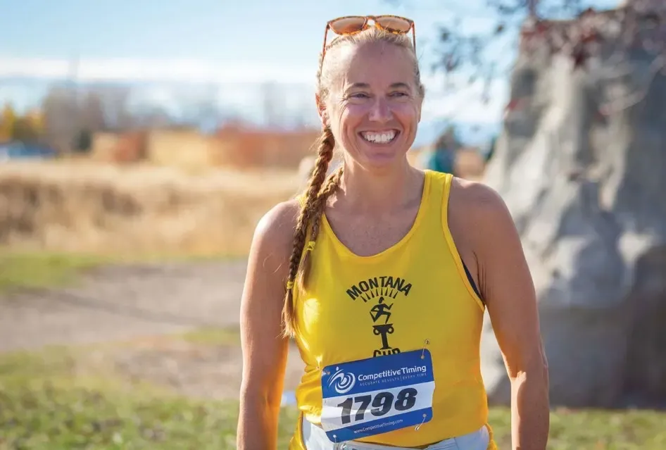 The Race of Every Runner's Dreams 2 Leigh Holleman in a gold Bozeman singlet at the Montana Cup