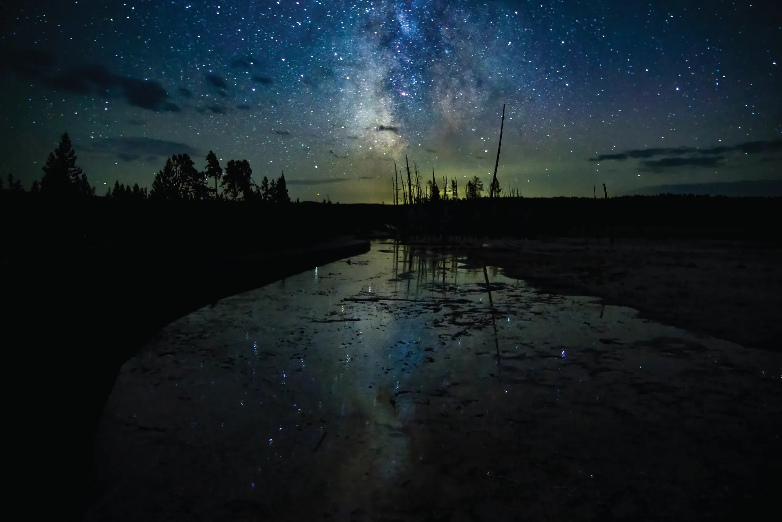 Turning Down The Lights 1 The Milky Way above steam rising from the Fountain Paint Pots in Yellowstone National Park